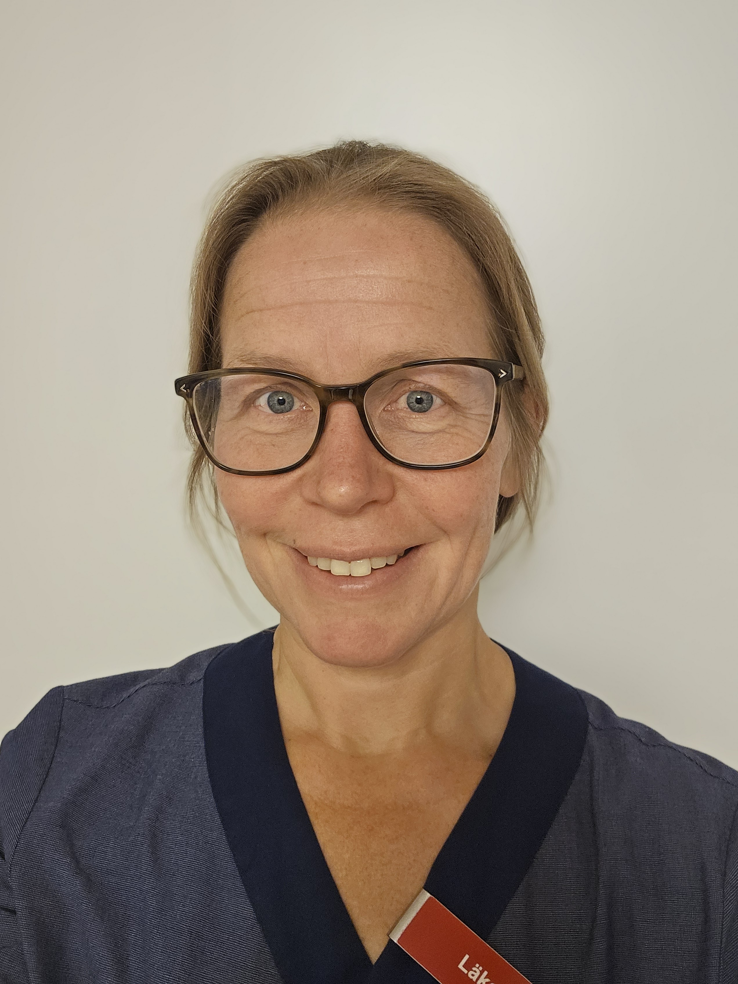 Porträttbild på Anna-Karin Roos